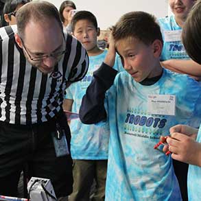 A child learns about leadership in the ring at the LEGO FIRST competition at Google in Mountain View